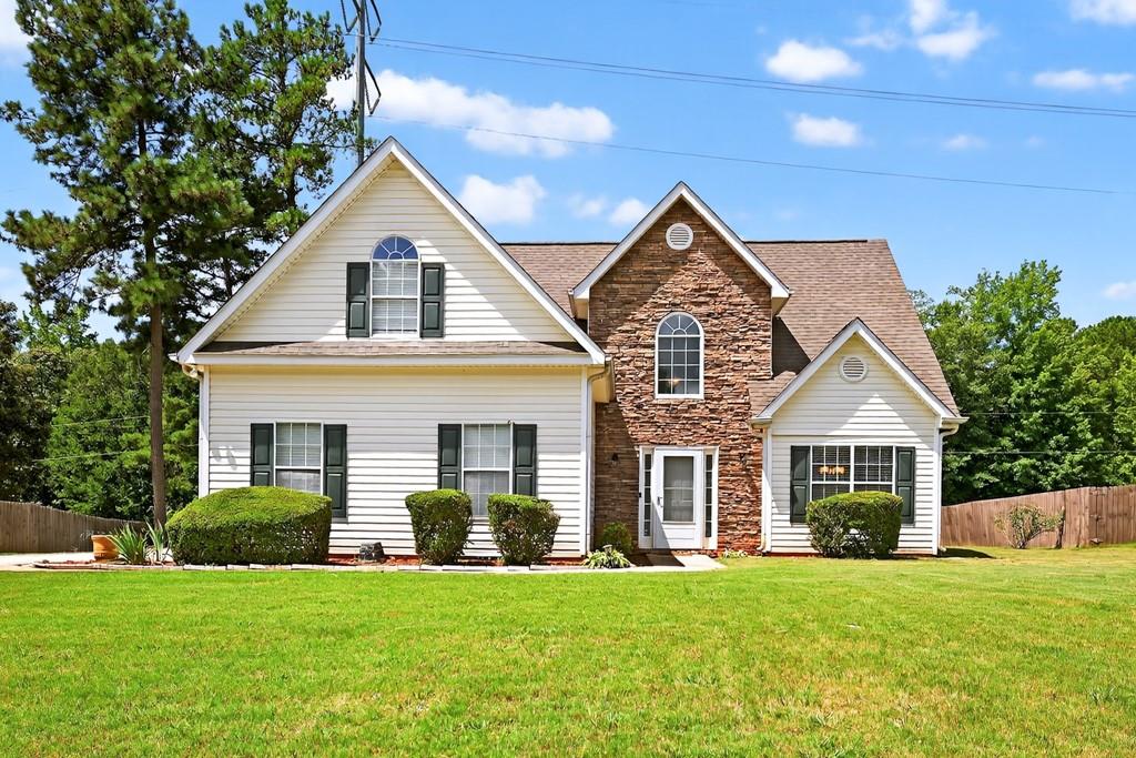 Gorgeous Home in Union Grove School District! Welcome to 941 Arbor Way — located in the highly sought-after St. Andrews at Rockport community. This beautifully maintained 4-bedroom, 2.5-bathroom home truly has it all. Step inside to soaring ceilings and an open staircase that overlooks the spacious living room. The vaulted ceilings and natural light will take your breath away. Enjoy luxury LVP flooring and plush carpeting throughout the home, adding both comfort and style. The brand-new kitchen is a chef’s dream — featuring sleek granite countertops, white shaker cabinets, stainless steel appliances, a breakfast area, and ample cabinet space for storage. The owner’s suite on the main level offers a peaceful retreat, complete with a luxurious bathroom that includes granite counters, a soaking tub, and a separate shower. Upstairs offers three spacious bedrooms with walk-in closets and additional bathroom. These rooms provide comfort and flexibility—ideal for guests, a home office, or hobbies. Step outside onto the patio and enjoy the beautiful, fenced backyard — perfect for entertaining and relaxing with family and friends. Don’t miss your chance to own this stunning home in an unbeatable location. Schedule your showing today — this one won’t last long!