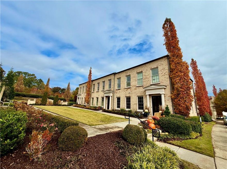 Discover the most sought-after rare townhome in Avalon/Alpharetta, featuring a two-story, extra-wide floor plan with a private carriage house and courtyard. This exquisite residence, as wide as a three-car garage, offers a spacious feel upon entry. Ideally located within walking distance to vibrant shopping, dining, and entertainment options, it provides unparalleled convenience in this dynamic live-work community. Enjoy easy access to GA-400, Downtown Alpharetta, the Farmers Market, Alpha Loop, and local events.
This stunning home boasts 4 spacious bedrooms and 5 luxurious bathrooms. The open-concept main floor features a chef’s kitchen with top-of-the-line appliances, including a Wolf microwave and coffee station, Sub-Zero refrigerator/freezer and wine fridge, and Monogram gas range and dishwasher. The kitchen seamlessly flows into the living and dining areas, enhanced by spectacular Nana accordion doors that open to a recently renovated courtyard with approximately 900 sq. ft. of rare, private outdoor space. Here, you’ll find an outdoor Napoleon built-in grill, gas fireplace, accent lighting, automatic irrigation, a water feature, and advanced drainage—perfect for entertaining or serene relaxation.
A flexible space on the main level can be customized as a bedroom, office, living room, or formal dining area, with convenient access to a full bath. Architectural elegance is evident throughout with gracefully curved corner walls and custom cove ceilings on the main level and in the master suite.
Upstairs, three generously sized bedrooms, each with its own bath, offer comfort and privacy. The owner’s suite is a true retreat, featuring an expansive walk-in closet meticulously designed for personalized organization and storage, paired with a spa-inspired bathroom. An app-controlled, ceiling-mounted speaker system is integrated into both the living room and outdoor living areas, completing this sophisticated home designed for modern living.
The carriage house/studio private suite can accommodate a king-sized bed, dining and living room furniture, has a full bath, and a kitchenette. Located above the three-car garage, this private suite offers approximately 800 sq. ft. of versatile living space, perfect for a guest, in-law, or teenage suite. The versatile carriage house includes a fully equipped kitchenette with premium appliances, such as a full-size Sub-Zero refrigerator/freezer, Wolf microwave, and Profile dishwasher.
Avalon has established high-speed fiber infrastructure to facilitate increased internet speeds for future needs. Additionally, GDOT has approved a loan to add new express lanes in both directions along a 16-mile stretch of Georgia 400 to improve traffic flow.