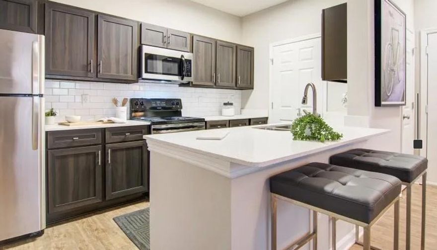 Minutes from Shopping, Dining, and Entertainment at Avalon. Located Next to Big Creek Greenway. Biking and Walking Trails. Resort-Style Swimming Pool. Grilling Plaza and Outdoor Fireplace. Cyber cafe and Business Center. Gourmet Coffee Bar.