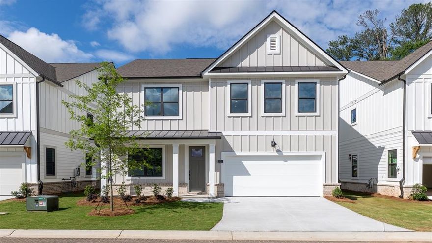 This stunning Hanover floor plan, currently under construction in The Villages at Sandy Plains, offers everything you're looking for in a new home. With 5 bedrooms and 3 baths, this spacious layout includes a bedroom and full bath on the main level, perfect for guests or a home office. The open-concept design features a modern kitchen complete with quartz countertops, exterior ventilated vent hood, a large island overlooking the dining area and living room, making it perfect for entertaining. Upstairs, you'll find four bedrooms, two full baths, laundry, and a versatile loft area. The home boasts luxury interior finishes and comes with D.R. Horton's industry-leading home warranty for added peace of mind. Located in a prime Marietta location, this community offers easy access to top-rated schools, shopping, dining, and major highways. Don't miss your chance to own this beautiful new home.