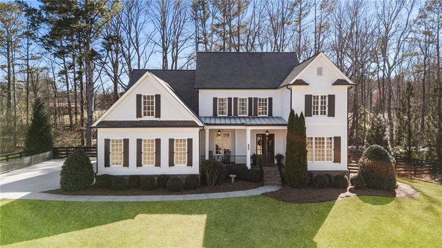 Nestled on one acre in a private, three home enclave, this modern farmhouse provides a welcoming atmosphere with an open-concept layout, perfect for entertaining.  The spacious kitchen and large pantry will give you plenty of room to cook and host gatherings, and you will have room for everyone with 6 bedrooms and 6.5 bathrooms.

The primary bedroom is located on the main floor - with brand new hardwood floors - and a large en-suite. Upstairs, you’ll find four additional bedrooms and three bathrooms, along with roughly 1000 square feet of unfinished walk in attic space. 

On the terrace level, you’ll find a bedroom and bathroom, office, gym or school room, living room, and theatre. Step outside to your own backyard retreat, where you'll find a refreshing pool and relaxing spa. 

Top-rated Milton schools, convenient access to shopping and dining, and a tranquil setting make this your dream come true. All new hardwoods on main and paint inside and out make this home better than new!