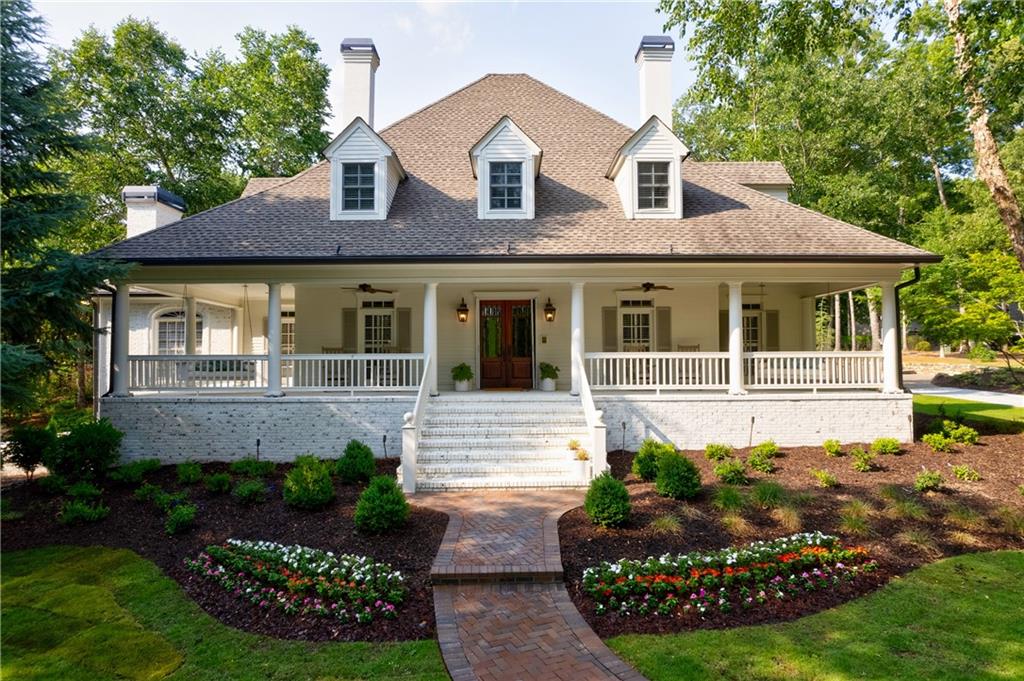Nestled in the heart of Johns Creek, this 6.54 acre estate offers a unique opportunity to own one of the most beautiful properties in the area. The flat, usable acreage boasts a stunning, heated pool featuring a waterfall, sun shelf, and hot tub, a brand new state of the art putting green, a covered outdoor kitchen, and ample patio seating including a retractable screened porch. This property provides a luxurious, resort feel in the comfort of your own backyard. Inside, the open floor plan showcases a gourmet kitchen with Sub-Zero and Wolf appliances, marble countertops, an oversized walk-in pantry, a breakfast nook, and a keeping room with a double-sided fireplace. Off the kitchen, the family room features a floor to ceiling stone fireplace with built-ins on both sides along with an impressive, barreled ceiling all with spectacular views of the pool and luscious backyard. The oversized main bedroom and en suite is tucked away on the first floor with separate his/her closets, separate vanities, a stackable washer and dryer, a double shower, and a soaking tub. Additionally, 3 spacious bedrooms, each with their own private bathroom, await upstairs. The terrace level provides wonderful space for guests with a full kitchen, large living room area, as well as a bedroom, bunkroom, exercise room, 2 full bathrooms, and ample storage space. In addition to the 2 car attached garage, a detached luxury showroom garage connected to a pool house adorns the property. As if that wasn't enough, adjacent to the home is another 3 car garage with loads of possibilities. For the car lover, it can remain a garage, but for the horse or animal lover, it can easily be converted into the barn of your dreams. For those who need extra guest space, turn the garage into an extra guest house for a secluded spot for your family and friends to enjoy. With over $500,000 in upgrades, including a landscape overhaul, brand new driveway and pavers, fencing to enclose the property, fresh exterior paint, the putting green, and more, this meticulously maintained home and property offers a turn-key, one of a kind opportunity amongst all that Johns Creek has to offer.
Don't forget to check out the virtual tour video!
Please note this is 2 parcels of land being sold together; 125 Bellacree Road (3.43 acres) and 115 Bellacree Road (3.11 acres). The tax ID #'s are the following: Tax ID #: 11-1221-0475-008-7 (125 Bellacree Road) and Tax ID #: 11-01221-0460-009-2 (115 Bellacree Road).