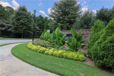 Photo of 1547 Paxton Drive SW, Lilburn, GA 30047 (MLS # 7593761)