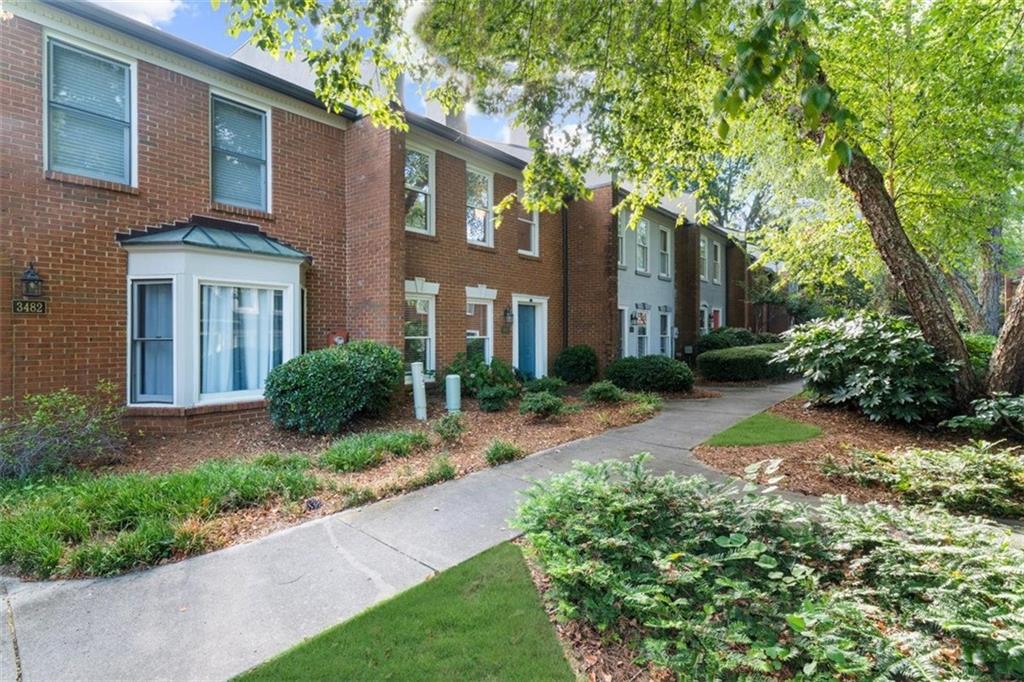 Enjoy quiet living amongst a beautiful tree-lined landscape in this freshly UPDATED move-in ready brick beauty. Spacious 2 bed/2.5 bath home located in ideal Duluth location, right on the cusp of Johns Creek and short drive to Downtown Duluth, so many resturants, shopping, Chattahoochee River Park, walking trails and easy access from Peachtree Industrial to Pleasant Hill/120 and 85.
You won't have to lift a finger. Renovated kitchen with brand new refrigerator, newer appliances, updated cabinets and more! New paint and new carpeting throughout. Brand new HVAC & hot water heater. This home has a great open layout as well with spacious living room area with cozy fireplace, oversized dining area off kitchen, lots of cabinets and counter space in the kitchen, extra large half bathroom with laundry area included on main level. Upstairs has a great roommate/split bedroom plan with two generously sized rooms each with great closet space, ensuite to large bathrooms one with a tub/shower combo and the other with a shower only. Plus enjoy nice outdoor space with private back patio adjacent to extra large carport and enchanting green space in the front including a lovely gazebo.
This community includes so many ameniites: pool, tennis courts, lake with surrounding beautifully landscaped walking trail, lots of guest parking. HOA covers all of this and all exterior maintenance including roof repair, gutter cleaning, landscaping, pest control, termite and so much more. PLUS investment opportunities still currently available, rental cap has not been met. Don't miss this opportunity to make this inviting townhome your own!