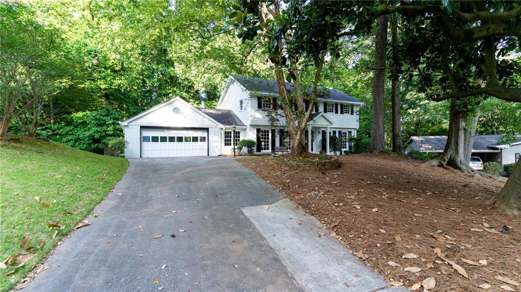 Enjoy living in this completely remodeled meticulously maintained custom home located on a large quiet cul-de-sac lot close to schools in a sought after I285 corridor. Recently painted inside and outside, new light fixtures, new cabinets, new appliances, gleaming hardwood floors, Separate Formal Living Room and Formal Dining Room, Gorgeous kitchen with granite countertops, under cabinet lights under beautiful cabinets, updated bathrooms, . Family room is equipped with second fireplace adjacent to keeping room with vaulted beam ceiling and a floor to ceiling Custom Wood Panel. A sunroom with lot of natural light overlooks the beautiful backyard. Home also features spacious bedrooms, nice bathrooms, a Franklin Stove, an Exercise Room, or a Game Room in the basement with new LVP Flooring. New paint on Exterior trim, two car garage, and a wide driveway. Landlord is a licensed real estate agent in the state of GA. The main level has three living spaces, a formal dining room and beautiful sunroom making it perfect for entertainment. The upper level has four large bedrooms, a hall bath and an in suite bathroom. The basement level is mostly finished and would be ideal for a home office, gym or media center. The house sits on a 0.6 acre lot on a quiet cul-de-sac walking distance to Marist, Montgomery Elementary, Murphy Candler Park, and Blackburn Park and minutes away from Perimeter Mall, I285 and 400.
