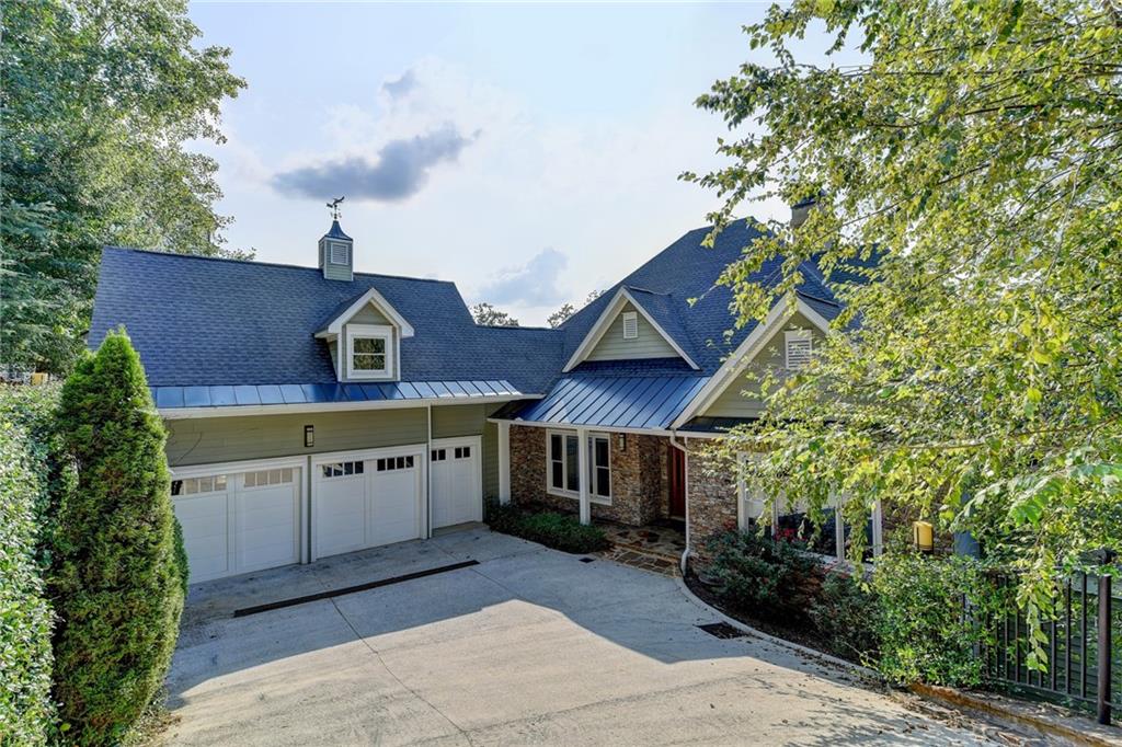 ***Minimum of a 6 month lease required. Must come furnished. Includes lawn maintenance & pool maintenance***Spacious Custom-Built Retreat on the northern end of Lake Lanier!! Direct access via cart path or stairs to covered 32’ x 32’ double slip dock, large deck on top, and two jet ski ports. Dock is adjustable and in deep water. Home also features a saltwater pool with swim jets, lights, and waterfalls. Porches on the main level in the front and in the back with stunning lake views for those in the Master, Office, Family Room, and Kitchen. Master has a large walk-in closet system maximizing space, spa bath, walk-in shower, dual vanity, and porch access. Gourmet kitchen with GE Monogram appliances with breakfast nook with vaulted ceiling boosting panoramic views of the lake while the foyer and family room have an impressive two-story vaulted ceiling, stone fireplace with built in bookshelves, and porch access! Also, on the main, Office, Study, Piano Room, walk-in Pantry, and Laundry rooms. Ceiling fans throughout the home. On terrace level there are two Bedrooms with walk-in closets, a Multipurpose room, and an entertaining Living Room all centered around lake views.