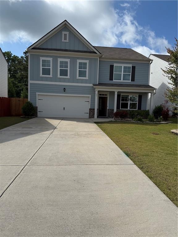 Nice home with bedroom on main. Located on cult-de-sac, few minutes walk to swimming pool, clubhouse, tennis courts, and playground. Minutes from GA 400 and Highway 53. Community is right by the North Georgia Premium Outlets and Lake Lanier. Easy drive to Cumming and Dahlonega. Highly sought after, Hanover plan home. Kitchen features stone gray cabinets, granite countertops, and pantry. Kitchen overlooks family room with corner black slate tile fireplace. RevWood flooring throughout most of main level. Upstairs loft. Spacious primary suite with garden tub and walk in shower. Home warranty negotiable.