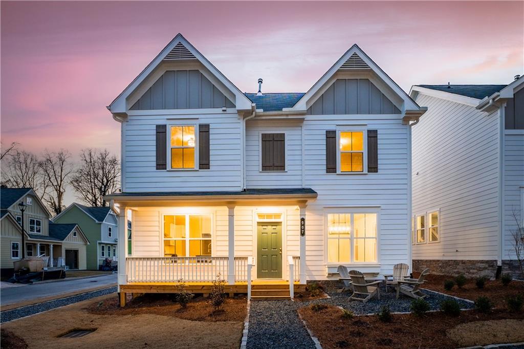 This charming Buford A plan (Lot 11), from Southwyck Homes, offers a gracious gathering and entertaining lifestyle for all. Boasting pure cottage influences from the 1920s and situated on a 6-acre tract at the northern edge of Clarkston, Parkside is an enclave of 36 intown cottages, moments from all that Decatur, Avondale Estates, and Tucker have to offer. Just steps from one of Intown Atlanta's most prestigious parks, Milam Park offers every amenity for a matchless intown living experience. With special attention to historical details, many homes face a central mews and are alley-fed in showcasing clean facades and inviting streetscapes, with quaint front porches that add to the sense of welcome and community. These carefully crafted homes pack all elements of city living together in these open floor plan where live/work often come together. The layout of the space is designed to allow you to create your own experience for the way you prefer to live in your new home – need room to host holiday dinners is there with a large living/dining room combo.
The 5-star gourmet kitchen includes soft close painted cabinetry with quarts counter tops. The appliance package includes 5-burner gas cook surface, stainless hood, microwave drawer, farmhouse sink and generous walk-in pantry. Organization is a breeze with the spacious mud bench upon entrance from the garage. Upstairs the landing nook can be used as you need - a reading spot or a home office, without impacting the use of the secondary bedrooms. The owner’s retreat is spacious and with a substantial, shared walk-in closet. The lavish spa-like bath has an oversized shower, double sinks set in quartz, and linen closet. Secondary bedrooms include spacious closets, and 1 has direct access into the upstairs secondary bath – and includes tile floors and tub surround along with quartz counter tops. Ask about $10,000 in incentives, 5% rate buy down rate and 100% financing for 1st time Home Buyers programs. On-site hours are Thursday/Friday 2:00-4:00 and Saturday/Sunday from 2:00-5:00