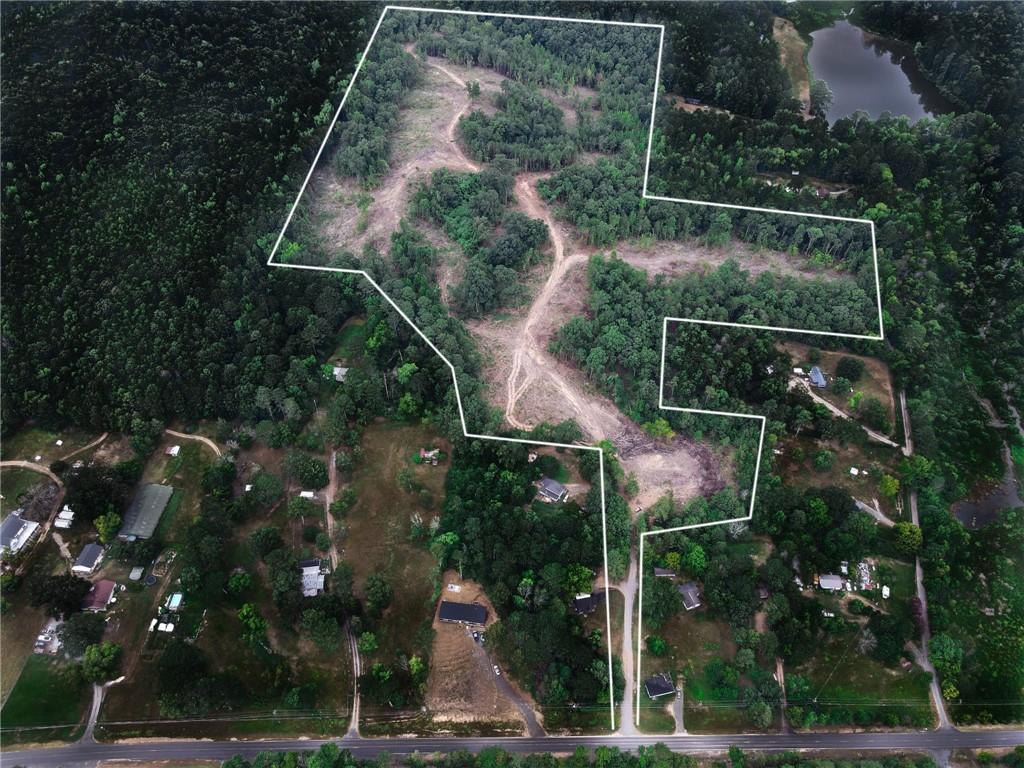 Welcome to a rare opportunity to own 50 expansive acres of pristine land in beautiful Rome, Georgia! This incredible property offers endless possibilities, whether you're looking to build your dream home, create a private retreat, or develop a potential investment project with gently rolling terrain with a mix of wooded and cleared areas. Located in a serene, rural setting with easy access to local amenities, this is a must-see property for anyone looking to invest in North Georgia's vibrant landscape.