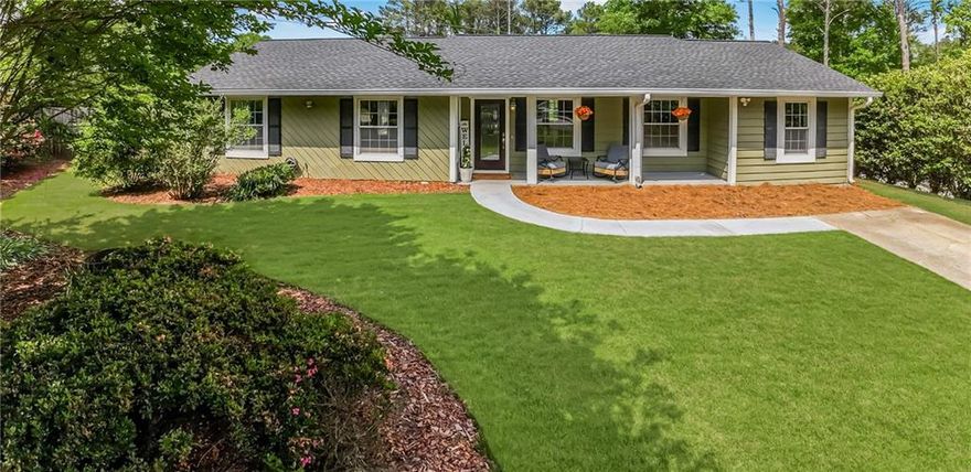 Welcome home to this charming ranch nestled on a quiet cul-de-sac located in the heart of East Cobb, Marietta!  Step into the recently remodeled kitchen complete with stunning quartz countertops, brand new stainless steel appliances and an abundance of cabinetry for all your storage needs.

The open-concept layout with soaring vaulted ceilings create a bright and airy atmosphere throughout.   A spacious multi-functional bonus room offers endless possibilities-ideal for entertaining, a home office, gym, playroom, media room, or anything you can imagine! 

Step outside to a large, fenced backyard perfect for kids, pets and outdoor living.  Garden planters are ready for your own herbs and vegetables.  Other features include new wood floors, updated bathrooms, walk-in closet in primary bedroom, expansive deck for relaxing and hosting, and two storage sheds, one with a built-in work bench.  Brand new roof!  HVAC and water heater both under 5 years old!

This home truly has it all, comfort, convenience and charm in a sought-after location with amazing East Cobb schools!