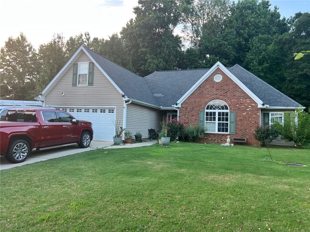 Located in a cul-de-sac with a creek and woods in the backyard, this 4-bedroom, 2-bathroom home features a warm family room, fireplace, high ceilings, a bonus room, and a great kitchen. The screened-in porch and wooden back deck are wonderful upgrades to the home—ideal outdoor spaces for grilling, entertaining, relaxing, and playing. Fire pit, Fruit trees, detached workshop, with professionally installed electricity for all your tools, newer roof, newer water heater, master on the main, ample attic, storage, near shopping, schools, and restaurants.