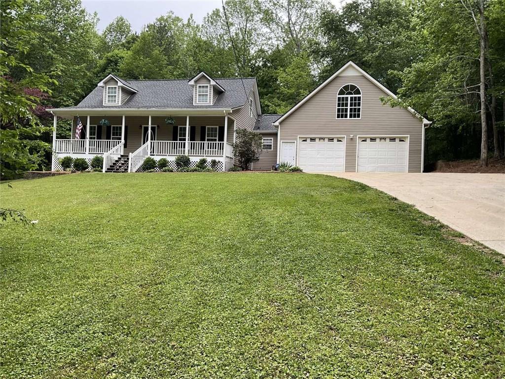 Beautifully renovated home in the city of Bremen, GA. In highly sought after Bremen City School district and located in a wonderful area with 2+ acres. This home sits back off the road overlooking the street and trees. The backyard is covered with nice trees and backs up to a small private dirt road. Lots of room for hosting and entertaining! Has a country front porch for rocking chairs or garden swing, along with 2 decks on the back side of the house. The home has an open floor plan with new paint, flooring, counter tops, and new light fixtures. The oversized 2 car garage has a large unfinished room that can be converted into a playroom/in-law suite or office. The primary bedroom is on the main level and 2 bedrooms upstairs. The primary bathroom has a garden tub and separate walk-in shower. This home offers the perfect blend of country living with all the modern conveniences. It is very convenient to I-20 and shopping.
