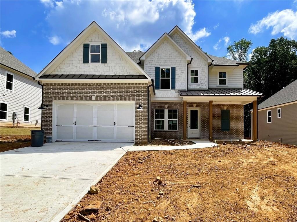 WINDSONG - AC 05 CHATHAM D - Welcome home to an exclusive collection of just 32 luxury homes by Windsong Properties! This exceptional location in Cobb County offers convenient access to shopping, dining, and recreational activities, all while being part of a highly-rated school district.
Luxury features in these homes include oversized kitchen islands with quartz countertops, 42-inch cabinets, and spacious walk-in pantries. The primary bedrooms boast tray ceilings and generously sized walk-in closets. The primary bathrooms come equipped with a free-standing tub and comfort-height toilets, along with quartz countertops in both the primary and secondary baths. Raised-height vanity cabinets and white rectangular undermount sinks add a touch of elegance.
Experience the unmatched quality and luxury that you expect from Windsong homes!
Some photos are of the same floor plan. Appointments are available to view the community and similar homes. This home will be move-in-ready in October 2025.