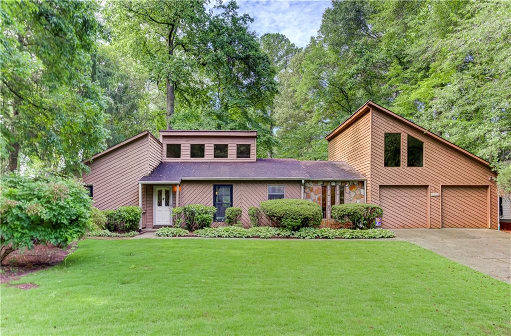 Welcome to this beautifully maintained 3-bedroom, 2-bathroom home offering 2,123 square feet of comfortable living space in a highly desirable, family-friendly neighborhood with top-rated schools.
Step inside to find a thoughtfully designed layout featuring an open-concept dining area that overlooks a cozy sunken living room with stunning beamed ceilings and a classic stone fireplace—perfect for entertaining or relaxing evenings at home.
The spacious kitchen boasts solid stone countertops, stainless steel appliances, a breakfast bar, and a bright eat-in area. Whether you're preparing meals or gathering with loved ones, this kitchen is both functional and inviting.
Enjoy peace of mind with both bathrooms having been fully renovated in the last two years. The primary suite is a true retreat, complete with a large closet and a beautifully updated en-suite bathroom featuring a tiled shower and a brand new soaking tub. The two additional bedrooms are generously sized and share a fully renovated hall bathroom with modern finishes and a tiled-in shower.
Outside, the curb appeal shines with a level, landscaped front yard and a serene backyard oasis that includes a flagstone patio, raised flower beds, and lush plantings—ideal for outdoor entertaining or gardening.
This home offers the perfect blend of comfort, style, and location. Whether you're a first-time buyer or looking for a long-term residence, this is a wonderful opportunity.