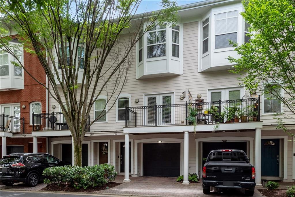 Beautiful updated Townhome in sought after Inman Mews Community! This amazing gated, townhome community is just steps from the BeltLine, Krog Street Market, MARTA, parks, restaurants, and more.
Freshly painted 2-bed, 2.5-bath home features an open layout with hardwood floors throughout the main level. The updated kitchen offers white cabinetry, stainless steel appliances, ample counter space, and a separate large breakfast room. The spacious family room opens to a private deck — perfect for relaxing or entertaining outdoors.
Upstairs, the oversized primary suite includes a large walk-in closet and a beautifully renovated bath with soaking tub, separate shower, and modern finishes. The guest bedroom has its own private updated bathroom. A nice flex space on the lower level provides endless options for a home office, gym, or media room. Extra large garage can hold 2 cars or great for extra storage. Water, gas, and trash included in HOA fees. Enjoy low-maintenance living in one of Atlanta’s most walkable and vibrant neighborhoods!