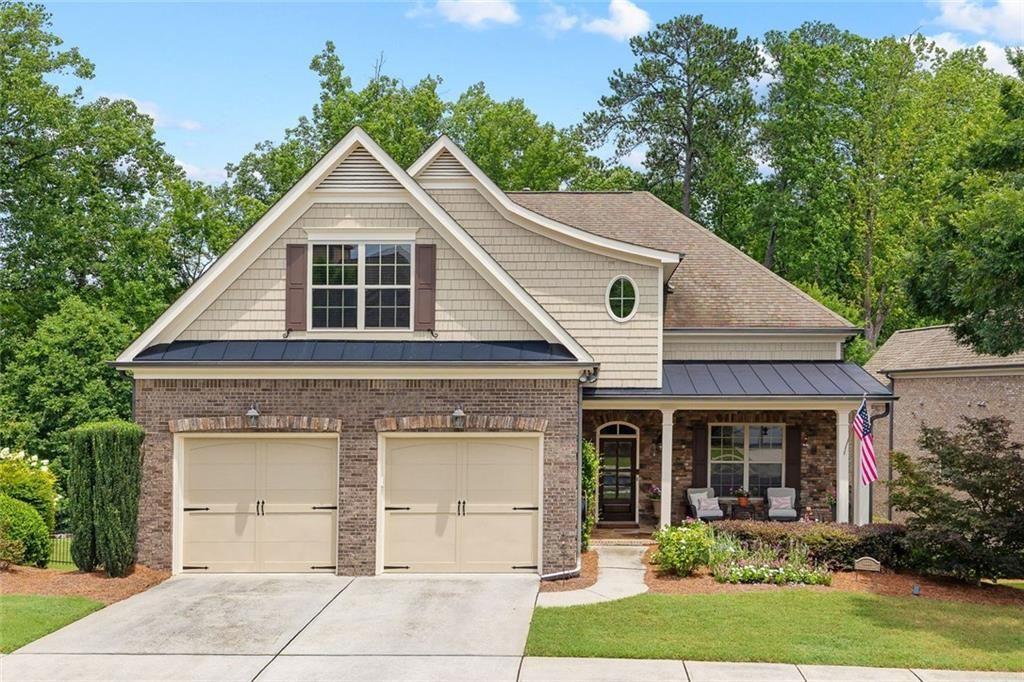 Start your next chapter here at prestigious Brookhaven at Johns Creek – Active Adult 55+ Community! Award winning Ansley I floor plan is well known for the smart and spacious design. This home has been LOVINGLY and METICULOUSLY maintained. The MAIN LEVEL truly shines with beautiful hardwood floors that flow seamlessly through the open-concept living areas. Private OFFICE/study has abundant natural light and overlooks the pretty front porch. FAMILY ROOM features a gas fireplace flanked by attractive built-in bookcases, ready for your favorite photos and cherished collections. You’ll love entertaining friends and family in the gourmet remodeled KITCHEN with new top-of-the-line Kitchen Aid appliances; beautiful cabinets that offer ample storage, granite countertops and under-cabinet lighting. DINING area features enough space to easily seat 8 (or more) guests. PRIMARY SUITE is extremely spacious with huge walk-in shower, double sink vanity with granite countertops and linen tower for storage. The custom closet is simply fabulous, providing organized space for your wardrobe. LANAI offers a private and tranquil wooded view and is perfect for watching TV, reading, dining, or just relaxing. The EZBreeze energy efficient windows are easy to open/close. You’ll love the stacked stone fireplace. The adjacent grill deck makes barbecuing easy and convenient. UPSTAIRS, you'll find a spacious and elegant master-guest suite. This large bedroom is versatile enough to include a sitting area, a comfortable sleeping area, a private full bath, and a cozy reading nook. Plus, there's an incredibly spacious and convenient heated and cooled walk-in storage area – perfect for seasonal items. The TERRACE level expands your living possibilities even further. It offers flexible recreation space, another spacious guest-master suite with a full bathroom, and an incredible workshop/storage area for your projects and hobbies. And for the wine enthusiast, a dedicated wine room provides cooled storage for over 900 bottles, alongside an inviting dining and tasting area – perfect for any kind of party! A sense of COMMUNITY is so important to an Active Adult lifestyle. This community offers resort-like amenities that enhance your lifestyle. Enjoy the pool, well-appointed clubhouse, state-of-the-art fitness center, tennis and PICKLEBALL courts, community garden, and scenic walking trails. You'll love the many planned activities – a wonderful way to meet neighbors and friends. CONVENIENCE is key!! Easy access to a variety of restaurants, shopping destinations, Emory hospital and medical facilities, and several golf courses and country clubs. Come and check this out – the perfect combination of classy design, practical comfort and a vibrant community.