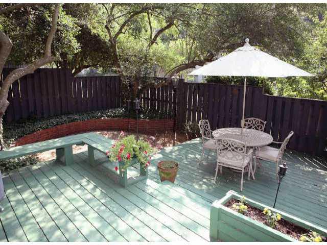 Just painted (all neutral) and updated with granite and ceramic tile in kitchen. Lowest priced 3 bedroom in the community. Hardwoods and crown molding. Great deck area pefect for entertaining. Covered garage with extra storage space. Brand new Fridge and Water Heater.