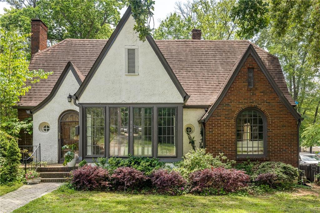 Introducing a Magnificent Turn of the Century Gem in College Park! Welcome to this exquisite home located in the charming, historic area of College Park, Georgia. Designed by the renowned architect Leila Ross Wilburn, this remarkable residence seamlessly blends historic charm with modern updates, preserving the authenticity and allure of its original design. Upon entering, you'll be captivated by the custom rounded archways and cathedral dome living room ceiling that grace the interior, inviting you into sunlit rooms that exude warmth and elegance. The spacious floor plan is perfect for entertaining guests. Recently renovated, the chef's kitchen is a culinary enthusiast's dream, equipped with state-of-the-art appliances. The grandeur continues as you step into the master bedroom, a peaceful haven that leads to a well-appointed en-suite bathroom. The en-suite is a luxurious retreat, featuring a stand-alone bathtub, a refreshing shower, and a double vanity. Outside, the oversized corner lot beckons with its enchanting features. Take a dip in the heated in-ground salt pool on warm summer days, surrounded by landscaping that adds a touch of natural beauty. The detached garage currently serves as a workshop with great storage. Situated within a short stroll from Barret Park, Woodward Primary, and a vibrant array of local restaurants and shops, this home boasts an enviable location that combines convenience with tranquility. The neighborhood's tree-lined streets and picturesque surroundings create an idyllic setting for families and professionals alike. Don't miss the opportunity to own a piece of history and make this extraordinary home yours.