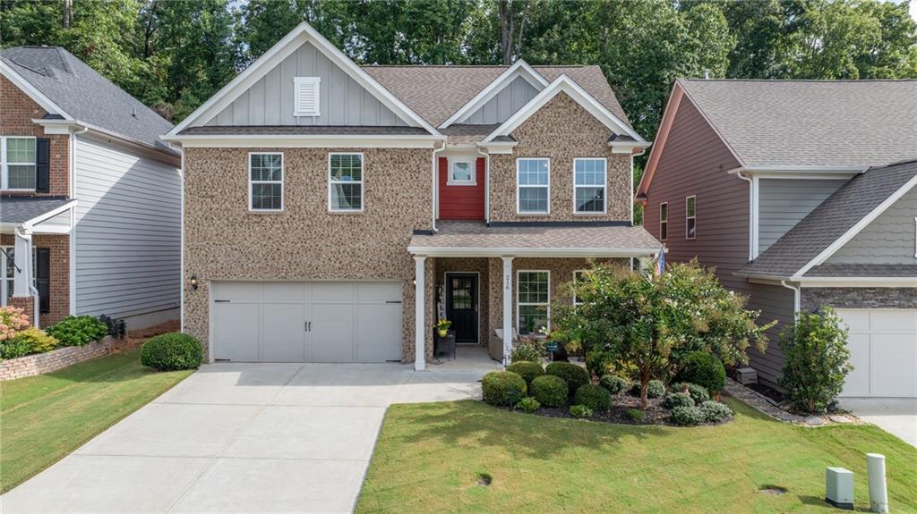 Welcome home to this meticulously maintained 4-bedroom, 2.5-bathroom residence in the highly desirable Woodmont Golf & Country Club. Nestled on a FLAT LOT with a PRIVATE WOODED BACKDROP, this home offers both comfort and tranquility.
A welcoming rocking chair front porch sets the tone, while the EXTENDED BACK PATIO with fire pit creates the perfect space for entertaining or relaxing outdoors. Inside, the open floor plan allows the kitchen to flow seamlessly into the living areas, creating a warm and inviting atmosphere for everyday living.
The MAIN-LEVEL PRIMARY SUITE provides convenience and privacy, while three additional bedrooms upstairs offer plenty of room for family or guests. The main level also features two separate office spaces, ideal for working from home, studying, or flexible use.
As a resident of Woodmont, you will enjoy RESORT-STYLE AMENITIES including swimming pools, tennis and pickleball courts, a fitness center, clubhouse, and a full calendar of neighborhood events. Golf memberships are offered separately, providing access to the award-winning Robert Trent Jones-designed course. The community also features multiple dining options and a vibrant social scene, all within close proximity to top-rated schools, parks, and shopping.
This home blends peaceful surroundings with thoughtful design and a lifestyle you will love to call your own.