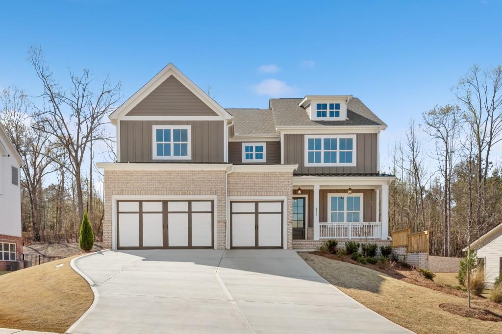 The Longwood plan built by Peachtree Residential. Quick Move-in! Lakeside serenity just got better! This gorgeous 5 bedroom basement home welcomes you with a wide foyer leading into an airy, open floor plan feel with large family room equipped with a direct vent gas fireplace & overlooked by a sparkling kitchen with luxurious countertops, gas cooktop, under cabinet lighting, and more. Rounding out the main level is a spacious guest bedroom with full bath. Upstairs you will find your immense private retreat accented with striking wood beams and accompanied by a spa-like bathroom with humungous tiled shower, and shimmering free standing tub. Three other secondary bedrooms each with full bath cap off the upstairs. A full basement with exterior entry awaits down stairs for you to fulfill your imagination. Outside you will find the perfect covered deck ready for you to enjoy those perfect summertime sunsets. Don't miss out on your opportunity to get in on one of the most coveted communities in Cumming. Call TODAY!