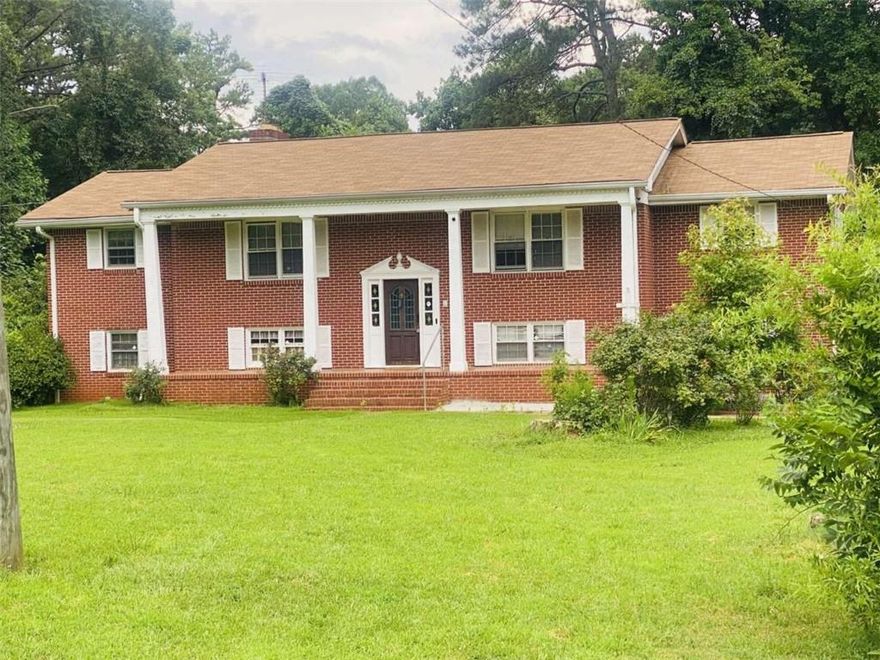 Back on The Market! No fault to seller.  Buyer couldn't secure financing. Bring This Stately Beauty Back to Life!    Estate-owned and full of potential, this classic four-sided brick property is waiting for the right buyer with vision to restore its former glory. Nestled on 3.3 private acres with no HOA restrictions, this solid home offers endless possibilities for someone ready to create something truly special.    Currently holding a special use permit as a transitional home (formerly a school), the property boasts spacious interiors with plenty of room to reimagine its layout. Imagine enjoying serene evenings on the screened-in back porch, surrounded by mature trees and ultimate privacy.    Please note: This property cannot be used as a primary residence without county approval due to its current special-use designation.    All current furnishings convey, giving you a head start on transforming this property into your dream estate, creative retreat, or unique business opportunity.    Opportunities like this are rare-a stately property with land, privacy, character, and limitless potential. Bring your ideas and breathe new life into this remarkable piece of real estate.  Property sold "AS IS"  Property is currently occupied. Schedule through ShowingTime.  Preferred attorney, Chris Little of Parkway Law. You'll love  working with a cooperative and professional listing agent who's committed to getting the deal DONE!
