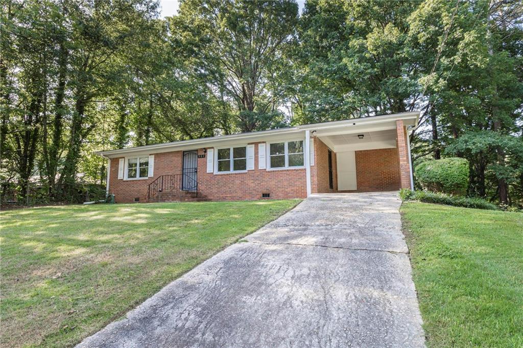 First-time buyers may be eligible for up to $15,000 in down payment and closing cost assistance—plus, some programs offer 100% conventional financing with no PMI! Ask for details.
Solid, all-brick home sitting on a rare double lot—half an acre of space in the city! 804 Brookdale offers a great layout with three true bedrooms, original hardwood floors, and a large eat-in kitchen that’s ready for gatherings, weeknight meals, or whatever your day calls for. The home has been well cared for and is completely move-in ready, offering a comfortable place to land from day one with room to grow over time.
What really sets this property apart is the lot size—hard to find in this part of town, especially at this price point. Whether you’re dreaming of a big garden, need space for pets to roam, or are thinking long-term about expansion, this lot gives you options.
Located in a quiet pocket of southwest Atlanta, you're tucked away from the busyness but still close to the BeltLine, Lee + White, Tyler Perry Studios, and a growing list of restaurants, parks, and breweries. It's a great opportunity to get into an established neighborhood that continues to see positive momentum—without having to take on a project right away.