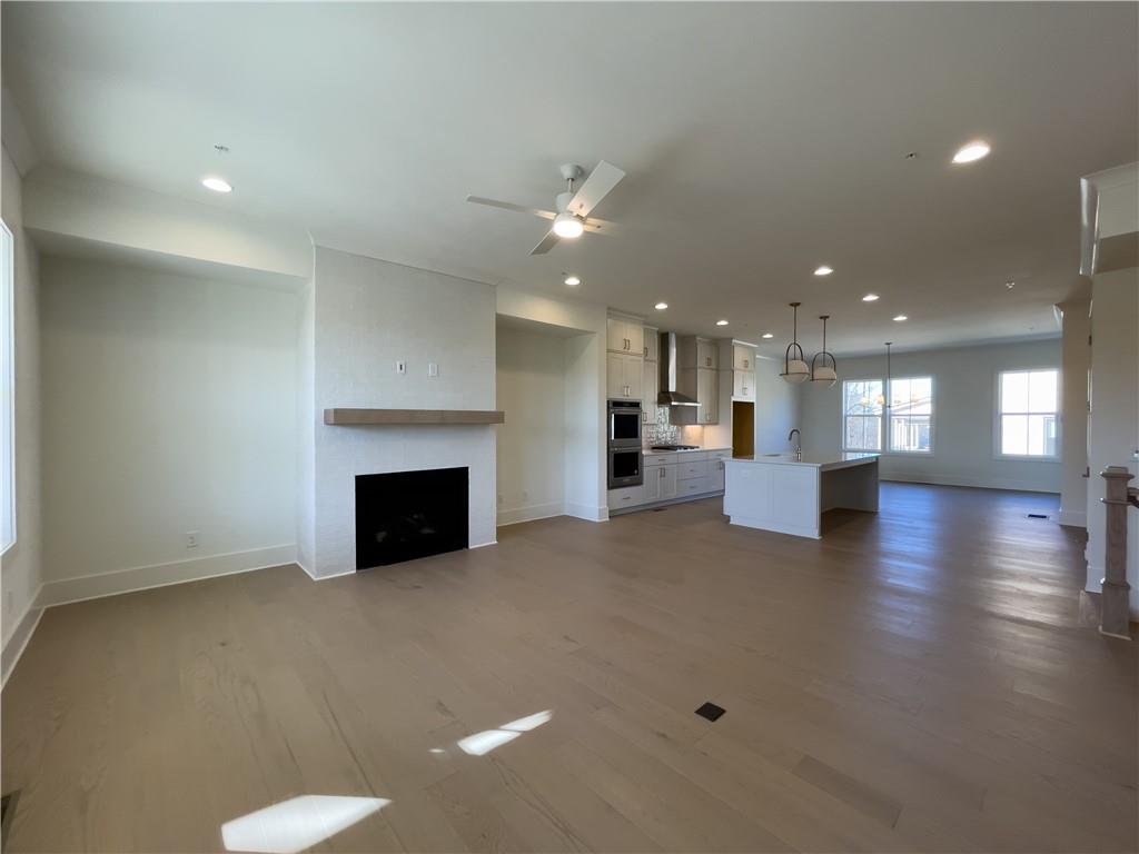 Introducing Empire Chiswick’s Newest Plan – The Harleigh Basement | Move-In Ready! Welcome to The Harleigh Basement, a stunning new offering in the heart of Empire Chiswick, Downtown Alpharetta’s premier luxury townhome community. MOVE-IN READY, this home boasts a beautiful brick elevation with street-level entry from Thompson Street, perfect for returning home after enjoying a stroll through Downtown Alpharetta or shopping and dining at Avalon.
Designed with luxury in every detail, Empire Chiswick combines classic charm with modern convenience. This exclusive 43-home community connects to the Alpha Loop and offers four architecturally inspired districts, blending timeless brick design with walkable access to the city’s best amenities. Much like its namesake in London, Chiswick is a peaceful retreat at the edge of vibrant urban life—complete with semi-private courtyards, formal gardens, and richly appointed interiors. The Harleigh plan is elevator-ready and offers exceptional flexibility and elegance throughout.
Key Features:
First Floor: Spacious Rec Room ideal for an office, guest suite, or in-law space with a full bathroom
Main Level: Open-concept living featuring a fireplace in the Family Room, oversized kitchen island perfect for entertaining, chef’s kitchen with high-end stainless appliances, 42” soft-close cabinets, walk-in pantry, butler’s pantry, elegant dining room, and a tech/drop zone
Third Floor: Luxurious Primary Suite with spa-like bath including walk-in shower with bench, soaking tub, and custom walk-in closet. Two additional bedrooms share a full bath, plus a separate laundry room
By Appointment Only – Contact us today to schedule your exclusive tour of our beautifully designed model home and experience the best of modern living in a timeless setting.