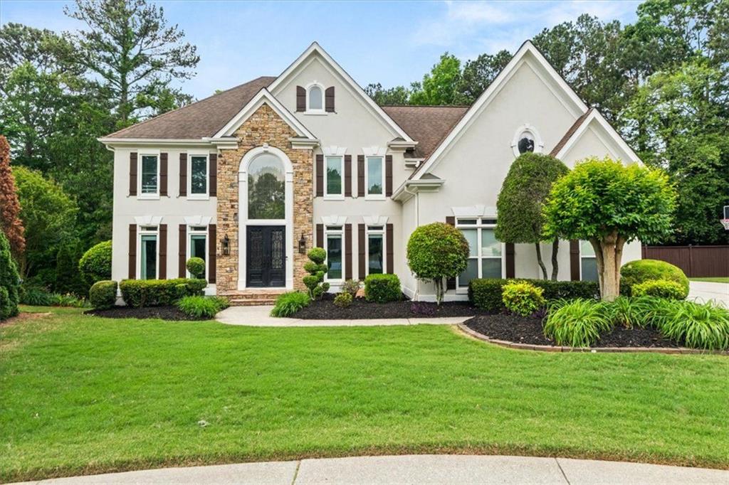 Welcome to 1008 Stream Valley Court – A Rare Gem in the Heart of Park Brooke! Nestled on a quiet cul-de-sac in the highly desirable Park Brooke subdivision, this stunning residence offers the perfect blend of luxury, comfort, and convenience. Located just minutes from GA 400, Avalon, Downtown Alpharetta, and award-winning North Fulton schools, this home places you in the center of everything while offering the peace and privacy of a premier neighborhood. Sitting proudly on nearly half an acre, the home features three spacious levels of living designed for modern lifestyles. The finished terrace level is an entertainer’s dream—complete with a custom bar, media room, gym, wine cellar, and a few hidden surprises you'll have to see to believe! Upstairs, discover five generously sized bedrooms, including a luxurious primary suite with its own sitting room, custom closets, and a spa-like bathroom retreat—your own private oasis. Step outside to enjoy a large deck, covered patio, and an expansive, fenced-in backyard—perfect for hosting unforgettable gatherings, relaxing with family, or creating your dream outdoor living space. With its unbeatable location, top-rated schools, and an array of high-end features, 1008 Stream Valley Court offers a lifestyle that’s as vibrant as it is comfortable.