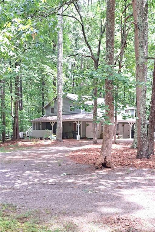 Escape to peaceful living in this furnished garage apartment*Nestled in a wooded, tranquil setting surrounded by horse farms and natural beauty. Gorgeous private area of Cherokee county with an Alpharetta address. Well water, mature trees abound. One car garage included. Move-in ready August 1st. Just bring the suitcase! Tenants are also welcomed to bring furnishings as well. 2 BEDROOMS!
