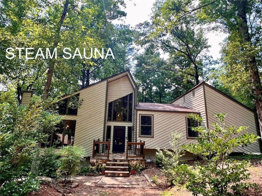 RELAX IN A WONDERFUL, SPACIOUS HOME IN A LOVELY AND PEACEFUL ESTABLISHED NEIGHBORHOOD. 
Totally renovated, this spacious home is situated on a serene 3/4 Acre quiet wooded corner lot in a private Cul-De-Sac. 
From a lovely front porch open door to a beautiful two-story foyer you'll walk into a spacious open great room with stone fireplace and vaulted cedar plank ceiling. Open plan dining room next to a large chef's kitchen with an island open to separate breakfast room, which opens to an oversized double deck patio. 
Huge loft overlooking great room that can be used as additional bedroom or an office with an entertainment area, movie theater. Bedrooms feature walk-in closets, and 3 luxurious bathrooms, 2 large car garage.
Stunning full In-Law or guest suite with a kitchenette, separate bedroom with closets leading to a full bathroom with Steam Sauna. 
A bonus room adds versatility and can be used as an office, exercise room or game room accessible to wet bar, full bathroom, Steam Sauna and laundry room.
Award-winning schools within a few blocks:  Sope Creek Elementary, Dickerson Middle, Walton High.
Conveniently located near all Shopping, Restaurants, Movie theater and Gym.
Walking distance to Cobb County Sport Park offers Baseball fields, tennis courts, Soccer, and much more, minute to Chattahoochee River National Recreation.
