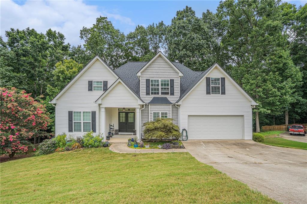 Property is on a CUL-DE-SAC. You cannot beat the finishes this home offers, hardwood floors, all granite counters, custom kitchen cabinets, custom tile, huge open floor plan, master on the main, large bonus room, lighting, and plumbing fixtures are the cherry on top. THIS IS A MUST-SEE!!!