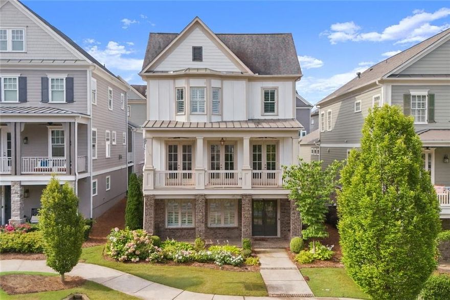 Downtown Woodstock in one of the best communities. Freshly painted throughout with new carpet. 3- car garage with a kitchen level entry. Equipped with an elevator shaft.  Inside, you’ll discover standout upgrades like a new high-capacity HVAC system (2022), whole-house surge protection, and built-in surround sound with custom lighting throughout. The gourmet kitchen impresses with ceiling-height cabinetry, a custom vent hood, walk-in pantry, and a dedicated coffee bar. There’s also a home office on the main level, perfect for today’s work at home lifestyle. *Designed with impeccable detail and premium finishes, this is more than just a home—it’s your gateway to the best of Downtown Woodstock living. you can live a lifestyle that has been thoughtfully designed to combine luxury with all the amenities and entertainment at your fingertips. This vibrant neighborhood has beautiful streets * sidewalks, walking trails, clubhouse, gym, pool, outdoor amphitheater, fire-pits (they even provide the firewood) walk to shops within the community or 1/2 mile walk (Golf Carts permitted) to downtown Woodstock restaurants, breweries and entertainment. Whether you’re looking to stay social with community clubs and planned events or simply soak in the energy of this lively setting, you’ll love the balance of activity and comfort.