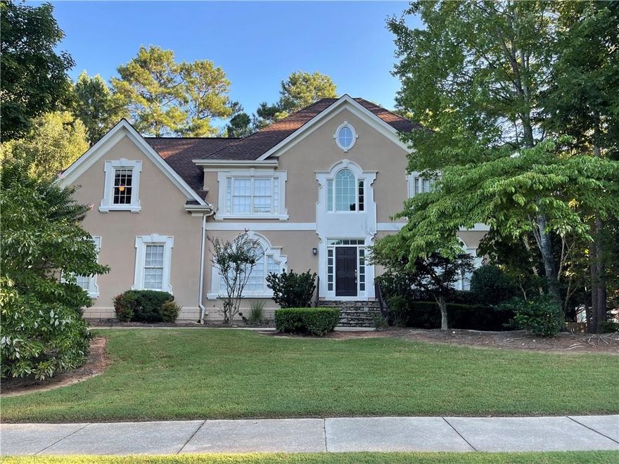 Fantastic home located in sought after Dunmoor subdivision. Dunmoor is a wonderful neighborhood with sidewalks throughout, a neighborhood pool, swim team, clubhouse, tennis courts and children's playground. The location of this wonderful house can't be beaten, the school bus stop is in front of this house! It has top-rated schools, minutes from Avalon and GA 400, and within walking distance to the Greenway. This home is on a level lot with a fenced and private backyard. Gourmet white kitchen includes granite countertops, SS appliances, tiled backsplash and is open to the family room and sunroom. The master suite is oversized with a sitting room, his/her walk-in closets, and a renovated bathroom with a frameless shower, travertine floor, double vanities. The daylight basement includes a full kitchen, full bathroom, 2 rec rooms, and a bedroom. The basement will be getting a complete renovation upon current tenants moving out. Updated pictures once renovations completed. Owners pay for lawn maintenance. Security deposit due 24 hours after binding lease. First and last months rent due 5 days prior to lease start date.