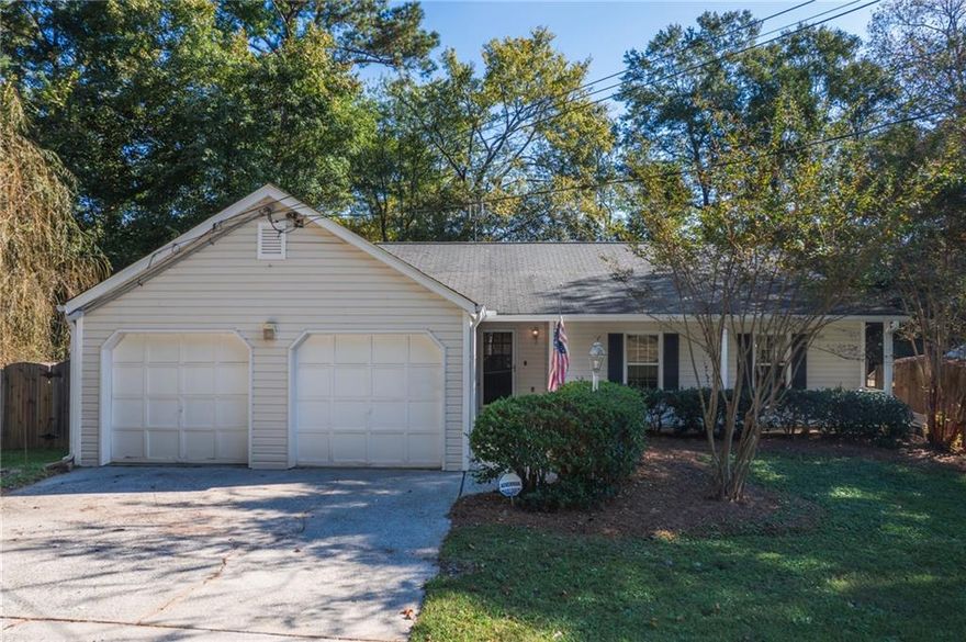 **Great Opportunity in River Oaks – Priced to Sell!**
Don’t miss this incredible value in the sought-after **River Oaks** community – **check the comps!** This home offers solid bones and tons of potential with a little TLC to make it truly shine.
Step inside to a **spacious great room** featuring a dramatic **cathedral ceiling**, cozy **fireplace**, and built-in **bookshelves** – the perfect space for relaxing or entertaining. The **open-concept kitchen** flows seamlessly into the great room and includes a **generous eat-in breakfast area**, **tile countertops**, and a **pantry** for ample storage.
Offering **three bedrooms** plus a versatile **bonus room** ideal for a home office, playroom, or guest space. The **primary suite** features a well-appointed **master bath** with **his and hers vanities** and all bathrooms include classic **tile flooring**.
Enjoy the outdoors on a **huge deck** overlooking a **fenced backyard**, ideal for pets, kids, or weekend gatherings. A separate **outbuilding** provides **extra storage** or workshop potential.
Located in a **top-rated school district** and just minutes from **restaurants, shopping, and Downtown Woodstock**, this home offers both convenience and value.  Price Reflected is AS-IS