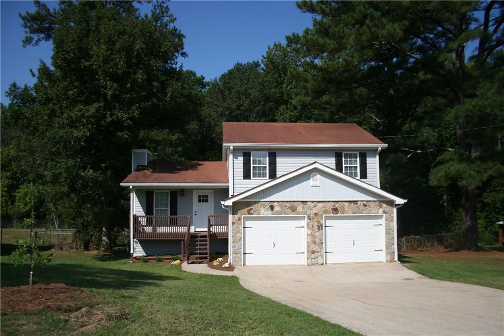 Adorable 3 bedroom, 2 bath home with vaulted ceilings in great room.  Recently renovated - move in ready!  New appliances, flooring, carpet and paint.  This home is a must see!  Fenced backyard and two car garage.  Large deck on the back for all the family BBQs.  Convenient area close to jobs and shopping.  Go see this home today - won't last long!  Seller is a licensed agent.