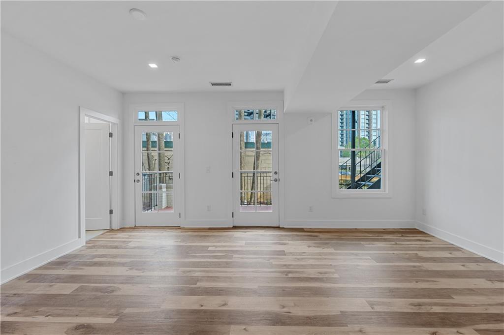 The Owners have fully Restored this Charming Building in an Incredible! Location. Sparing No Expense this Large STUDIO OR OFFICE SPACE features 10ft High Ceilings. Premium LVT Flooring. LED/Energy Efficient Lighting throughout. Full Custom Kitchens w/ Quartz Countertops, Custom Soft Close Cabinets and New SS Appliances. New Custom Bathroom features spacious Walk-In Shower w/ Floor to Ceiling Tile. Washer/Dryer Included. BEST OF ALL YOU OWN PRIVATE OUTDOOR SPACE/BALCONY. Off Street Parking. Walk to Publix, Buckhead Village/Shops of Buckhead and All Surrounding Establishments. Close to Everything Buckhead has to offer, Short Drive to Midtown and More. Ask Listing Agents about other units available.