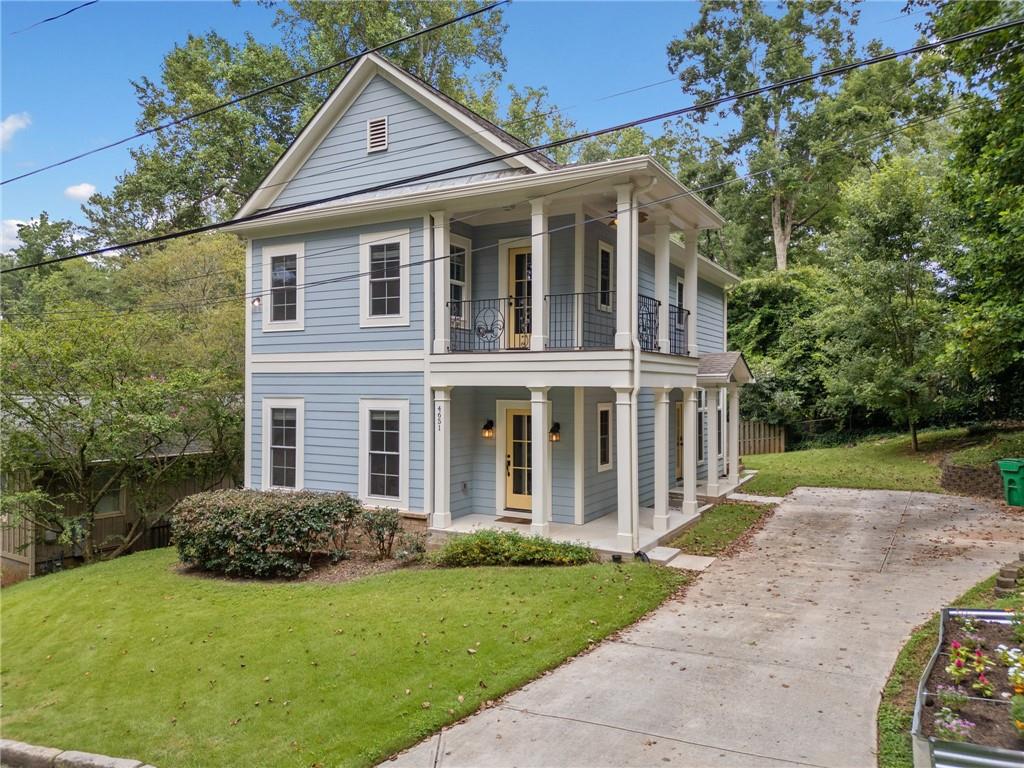 Nestled in the wonderfully whimsical, art-soaked haven of Pine Lake—Atlanta’s best-kept secret—you’ll find this delightfully versatile two-story home that’s full of surprises. Step in from the flat driveway into a light-filled kitchen with stone counters, modern appliances, and open space galore. The kitchen peers over a great room made for lounging, dining, and dreaming, and it all spills onto a sunny deck perfect for morning coffee or midnight star-gazing. Hardwood floors and soaring ceilings give the main level an airy feel, while a hidden gem awaits just beyond the front hallway—a cozy room with a secret closet tucked behind bookshelves (yes, really!) and a full bath nearby, perfect as a main-level bedroom, studio, second living room, or creative escape.
Upstairs, discover three more rooms, including an inviting primary suite with double vanity, walk-in closet, and access to a private porch plus two additional charming rooms that share a third full bath. The laundry room is thoughtfully placed here too—no stair-hauling required. Out back, there’s even an electric vehicle charger for the eco-minded, and out front, raised beds are ready for your next tomato or wildflower masterpiece.
The real magic? Pine Lake itself: a community of winding trails, a lake with a beach, playgrounds, and neighbors who celebrate creativity like it’s a way of life. You’re never far from Decatur or Avondale, but once you’re here, you just might never want to leave.
