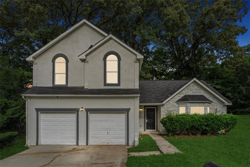 Welcome to 4464 Idlewood Park-a fully renovated 3BR/2.5BA gem nestled in a quiet cul-de-sac. This move-in ready home features brand-new stainless steel appliances, updated flooring, and a bright open floor plan perfect for entertaining or relaxing at home. The spacious owner's suite offers a spa-style bath, separate shower, and walk-in closet. Enjoy proximity to Arabia Mountain trails, Stonecrest Mall, parks, dining, and top-rated DeKalb schools. EVERY detail has NOW been updated to create a modern, low-maintenance lifestyle. Priced below market to generate immediate interest, this home is ideal for FHA buyers and those seeking high-quality finishes without the premium price tag. Comparable homes are selling quickly-but few show like this one. Clean title, fast closing welcome, and easy to show. Whether for a first-time buyer or move-up client, this property delivers incredible value. Don't miss your chance to secure this beauty-schedule your showing today!