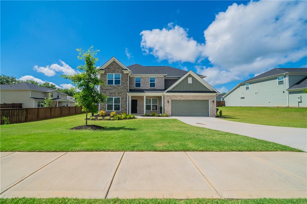 This beautifully updated home features fresh paint, new carpet, and gleaming hardwood flooring throughout. The kitchen offers white cabinets, a wall oven, and a gas cooktop, seamlessly flowing into the open living room and cozy breakfast room. Enjoy a spacious, private backyard perfect for relaxing or entertaining.