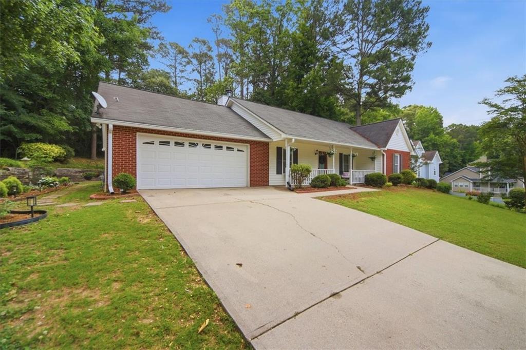 Photo of 9260 Scarlett Drive SW, Covington, GA 30014 (MLS # 7785509)