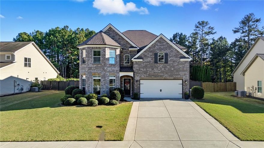 Welcome to your dream home in the highly sought-after Park at Steels Bridge! This beautifully maintained two-story residence features 4 spacious bedrooms, 4 full bathrooms, an office (that can be used as a bedroom) and countless upgrades throughout.

This home is loaded with upgrades and ready for its next owners! Featuring a brand-new architectural shingle roof (installed March 2025) designed for a 30-year lifespan, a tankless water heater for endless hot water, and fresh exterior paint completed in Spring 2024, this home offers true peace of mind.

The outdoor space is an entertainer's dream! The fully fenced, level backyard is huge, perfect for gatherings, play, or even a future pool. Enjoy a covered patio with a built-in gas line for your grill, a charming gazebo, and a built-in swing set, all designed for relaxation and fun.

Inside, you'll find an inviting open-concept layout connecting the family room, dining area, and updated kitchen with granite countertops, stainless steel appliances, gas range, and a bright breakfast nook. The cozy gas fireplace adds warmth and charm, while hardwood floors enhance the main level.

The oversized owner's suite features a spa-like bath with a soaking tub, walk-in tile shower, dual vanities, and a spacious walk-in closet. Each secondary bedroom offers generous space and storage.

Community amenities include a pool, tennis and pickleball courts, and a basketball court. Conveniently adjacent to Bridgemill with optional access to the Bridgemill Sports Complex. Zoned for highly sought-after Woodstock High School and close to Cherokee Classical Academy, The King's Academy's new sports complex, shopping, restaurants, and coffee shops.

Luxury, comfort, and location come together in this exceptional home, don't miss your chance to make it yours!