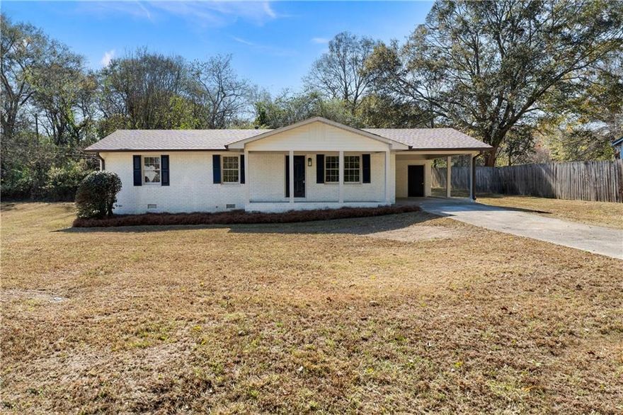 Prepare to be impressed by this beautifully remodeled 3-bedroom, 2-bath home that has been thoughtfully updated from top to bottom. Step inside to an inviting open floorplan enhanced by a stunning accent wall and all-new fixtures and lighting throughout. The completely redesigned kitchen serves as the centerpiece of the home, featuring quartz countertops, new cabinetry, stainless steel appliances, and an expansive island that provides ample workspace and the perfect setting for gathering. Both bathrooms have been fully renovated with stylish vanities, modern tile showers, and contemporary finishes that add a touch of luxury to everyday living. Additional updates include a brand-new roof, new HVAC system, fresh interior paint, and new flooring throughout, ensuring a truly move-in-ready experience. Situated on a generous lot, this property offers plenty of space for relaxing, entertaining, and enjoying the outdoors. With its combination of modern charm, quality craftsmanship, and thoughtful design, this home is ready to welcome its next owner.