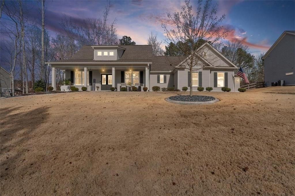 Photo of 7705 Wandering Oak Way, Cumming, GA 30041 (MLS # 7706133)