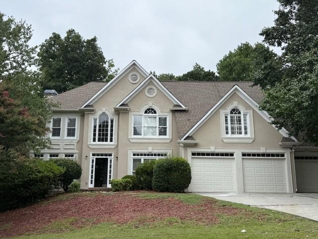 ATTRACTIVE STUCCO HOME IN HAMPTON HALL. JOHNS CREEK SCHOOL DISTRICT. FIVE BEDROOMS, FOUR AND A HALF BATHS. MAIN FLOOR FEATURES LIVING ROOM, DINING ROOM, FAMILY ROOM WITH FIREPLACE AND BUILT-INS, LARGE KITCHEN WITH ISLAND, BREAKFAST BAR, GRANITE COUNTERTOPS, WHITE CABINETS, AND STAINLESS APPLIANCES. SEPARATE BREAKFAST ROOM. FOUR BEDROOMS AND THREE FULL BATHS ON SECOND LEVEL. MASTER BEDROOM WITH THREE WALK-IN CLOSETS AND SITTING AREA. MASTER BATH FEATURES DOUBLE VANITIES, GRANITE COUNTERTOPS, SEPARATE TUB AND SHOWER, HIS AND HERS WALK-IN CLOSETS. FULL, FINISHED BASEMENT WITH REC ROOM, BEDROOM AND FULL BATH. SUSTAINABLE FLOORING ON MAIN LEVEL. NEW INTERIOR PAINT THROUGOUT. LARGE DECK OVERLOOKING WOODED BACKYARD, PATIO ON BASEMENT LEVEL. THREE CAR GARAGE.