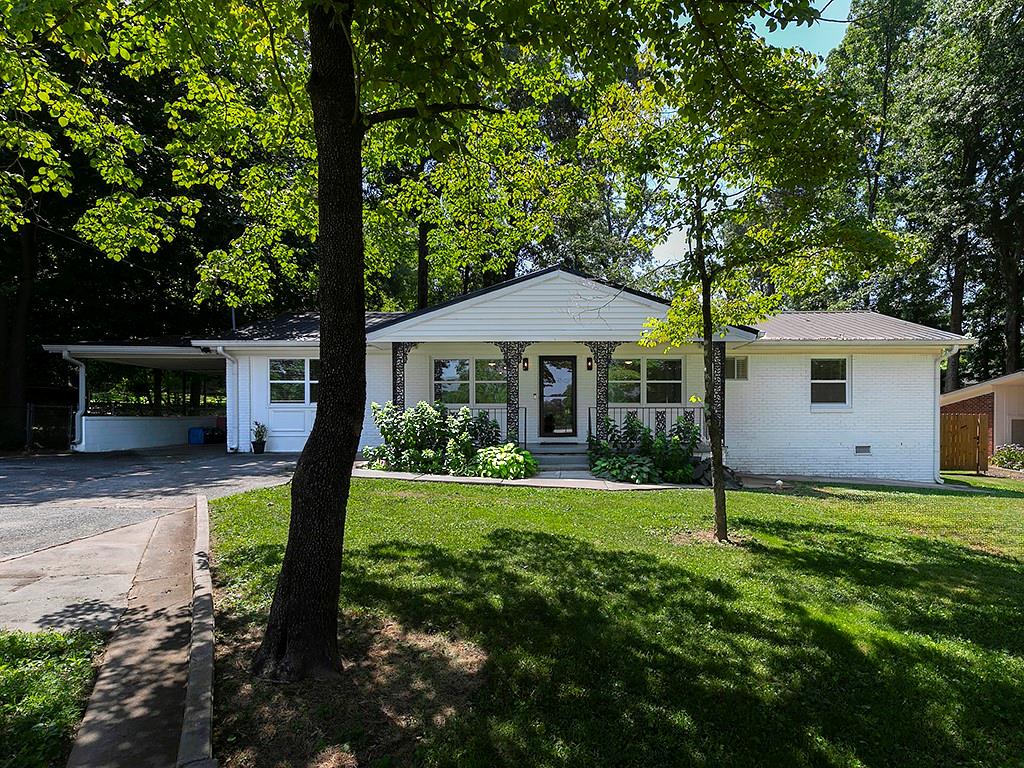 Welcome home to your charming updated brick ranch nestled in the heart of Argyle Estates, so close to the Smyrna Village. And, just minutes to the Battery/Braves Stadium. The location can’t be beat! Discover this white brick home with all its updates and trendy new details. The split floor plan with 4 bedrooms and 3 full baths is perfect for family, guests or roommates. And, take in the beautiful new white kitchen with stainless steel appliances and granite counter tops. The laundry area is complete with a mudroom and storage area. And, if you are looking for the perfect outdoor space, enjoy entertaining in the relaxing backyard and on the spacious deck. Your Outdoor Paradise! And, the location is in walking distance to Taylor-Brawner Park for Food Truck Tuesdays. School District - Teasley and Campbell. Living at its very best!