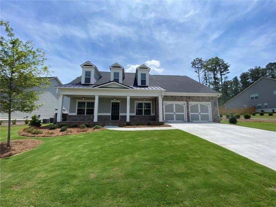 Active Adult 55+ Community in prime Marietta location brings high end features, space and comfort together for you to enjoy. Spacious home with covered front porch welcomes your guest.  Master on the Main Suite and 1 Guest bedroom on main level, Gourmet Kitchen with Quartz Counter tops, Under Cabinet Lights, Tile backsplash, Pantry, Laundry and Mudroom bench.  A Fireside Family room with shiplap detail on ceiling and recessed lights, site finished real Hardwoods, Den alcove with beautifully landscaped yard and Irrigation system.  Screened in rear Porch to enjoy morning coffee, sweet tea afternoons and glass of wine in the evenings!  The upstairs boast large walk in storage space/attic for your "extra" items or hobby area.  Two large guest bedrooms with walk in closets share a Jack n Jill bath and each bedroom is equipped with their own vanity.  New Carpet in Owners Suite and New FENCE just installed for added privacy!   Convenient Location to Marietta Square.  HOA FEE covers landscaping maintenance which will allow you more time to enjoy the walking trails, Kennesaw Mtn, local restaurants, shopping and the theater. HOA also covers Community Clubhouse with fitness room, Gathering area, Kitchen and covered patio with outdoor fireside area and walking trail is 0.9 miles all for you to enjoy.  Mount Calvary is beautifully designed and manicured community - come see what sets Mount Calvary apart from the other Active Adult Communities!