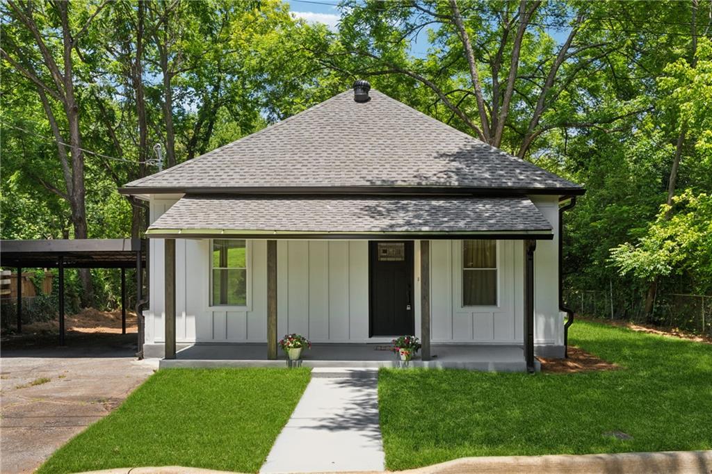 Just Minutes from Historic Marietta Square welcome to your next home. Luxury Living nestled in a peaceful neighborhood just minutes from the vibrant charm of Marietta Square, this home offers the perfect blend of location, lifestyle, and luxury. This fully renovated masterpiece has been impeccably reimagined to welcome home a new owner! No detail has been overlooked sep inside to discover a home filled with premium upgrades. The all-new kitchen is a true focal point, featuring striking cabinetry, quartz countertops, and sleek stainless steel appliances — ideal for entertaining and everyday living. A spacious primary bathroom offers an expansive tiled shower and luxurious finishes. Enjoy serene outdoor living on the covered front patio, overlooking your beautiful landscaped front yard. With easy access to the shopping, dining, and entertainment near Marietta Square, this home offers both tranquility and convenience. Truly move-in ready — luxury, comfort, and location all in one. This home is waiting for you to make it yours!
