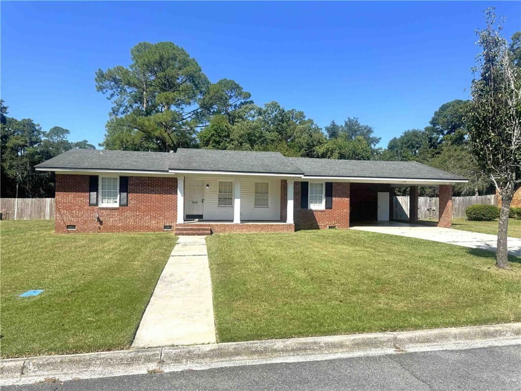 Welcome to this charming brick ranch-style home, built with sturdy construction and timeless appeal in the heart of Valdosta! Step onto the quaint front porch or enjoy gatherings on the back patio overlooking a very LARGE, FENCED BACKYARD-perfect for play, gardening, or relaxation. Inside, you'll find spacious living areas and a large kitchen ideal for everyday living and entertaining. A generous laundry room adds convenience, while the BRAND NEW LVP flooring brings modern style and durability throughout. Nestled in a quiet neighborhood within walking distance of schools and parks, this home offers comfort, functionality, and room to grow. Owner holds Active Real Estate License in the State of Georgia.