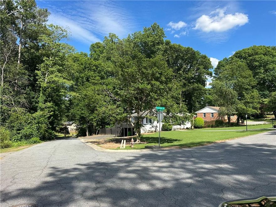 Welcome to 2059 Clearwater Drive, a beautifully maintained 4-sided brick home in the heart of Marietta, offering an exceptional blend of comfort and investment potential. This home, with no HOA, features extensive upgrades and is ideally located just off Powers Ferry Road, providing easy access to major routes, shopping, dining, and more. The property is perfect for multi-generational living or generating rental income, thanks to the two custom-designed basement efficiencies with independent access.

The main level boasts a bright living room, dining area, updated kitchen with integrated laundry, 2 bedrooms, and 1 full bath.

Efficiency #1: Side entrance with elegant French doors, full kitchen, living room, 2 additional rooms that can be used as bedrooms, spacious bathroom, and laundry.
Efficiency #2: Rear deck entrance, 1 bedroom, full bath, and kitchenette (no laundry).

Additional highlights:

Large wooden back deck, perfect for outdoor entertaining

New LED light fixtures throughout

Extensive security system with multiple new cameras

Partially fenced backyard with ample parking

Furniture may be included, if desired by the purchaser

Location Perks:

Convenient access to Powers Ferry Road and nearby Interstate 75, making commuting to downtown Atlanta, Cumberland Mall, and Truist Park a breeze.

Just minutes from The Battery Atlanta and Cumberland Parkway, offering a variety of dining, entertainment, and shopping options.

Located in a quiet neighborhood, yet close to major conveniences, offering the best of both worlds.

This property has been intensively modified and thoughtfully maintained, offering not only comfort and style but also significant investment potential in a prime, well-connected location.