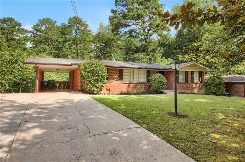 2 bedroom, 2.5 bath brick ranch with a partially finished daylight basement that includes a full bath. Quiet and private with a large fenced backyard overlooking a creek and surrounded by mature trees. The main floor gets great natural light and features neutral paint throughout. Includes a laundry room, carport, and a deck for enjoying the outdoors. Convenient to CDC, Emory, and I-85. Dogs are negotiable.